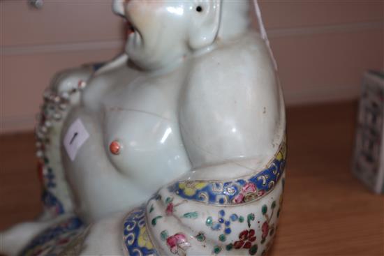 A Chinese famille rose figure of Budai and a Chinese pillow Budai 26cm